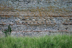 Ashlar blocks above flints below