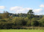 Bigbury Farm on the hill fort taken from the Stour